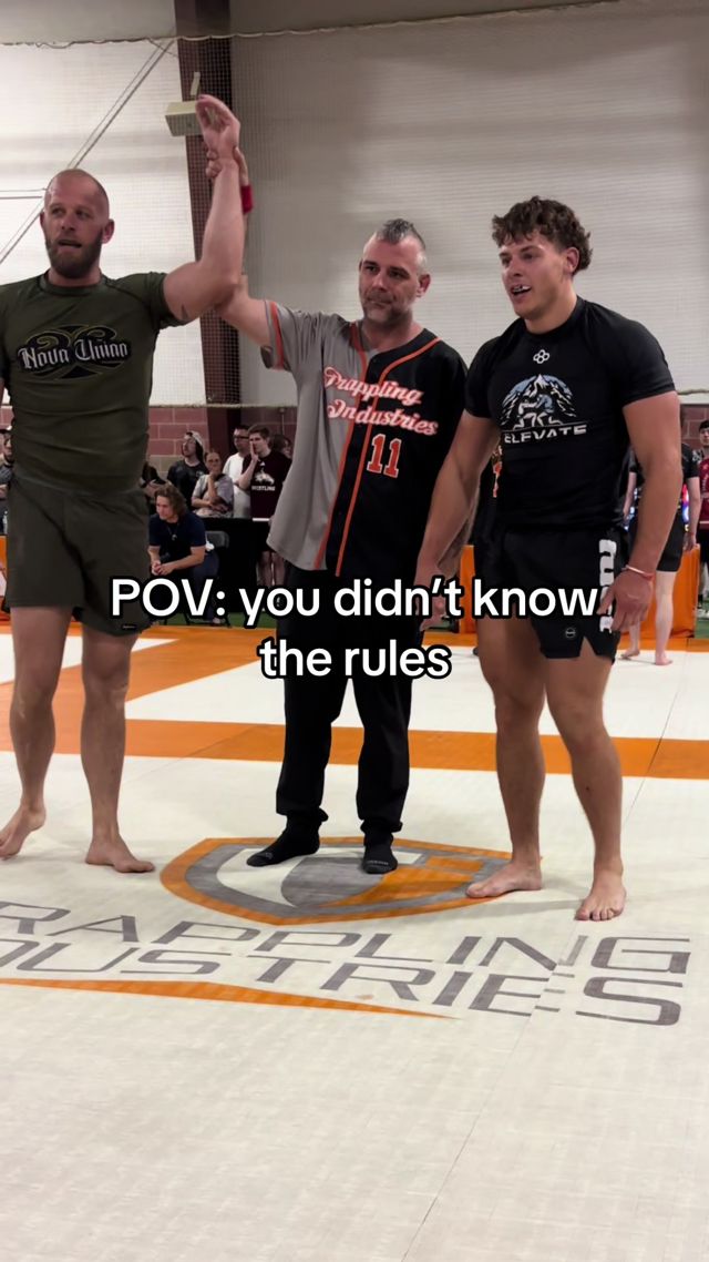 CJ Fazio getting his hand raised at a jiu-jitsu tournament
